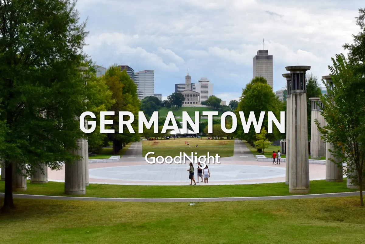 A wide view of the Germantown skyline bordered by an expansive green park and winding walking paths. The image is softly lit by the sunset, evoking a sense of calm and inviting viewers to enjoy the evening ambiance.